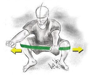 Squat with exercise band - Copyright ? Stock Photo / Register Mark