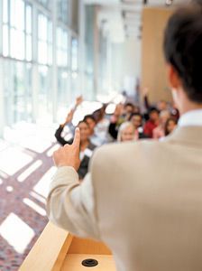 man in front of podium