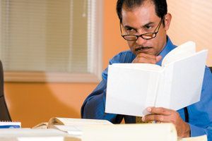 man reading book