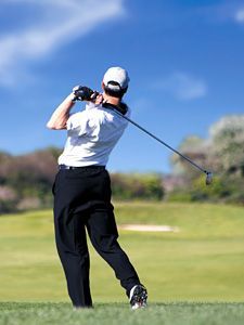 man golfing - Copyright – Stock Photo / Register Mark
